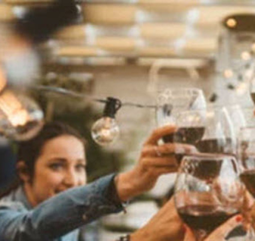 People toasting at a dinner party